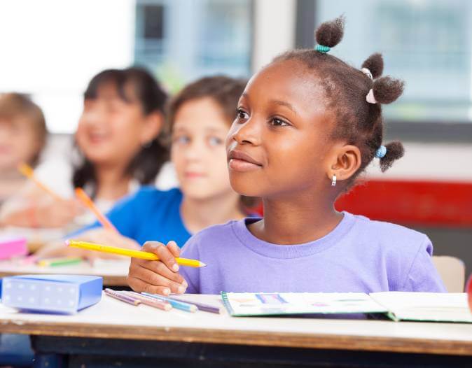 child paying attention in class