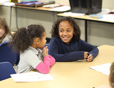 students laughing in class