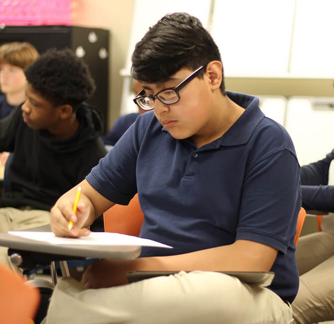 student reading in classroom