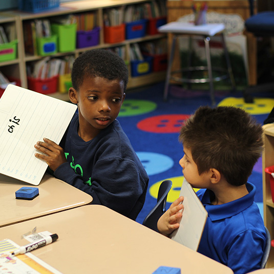 students talking in class