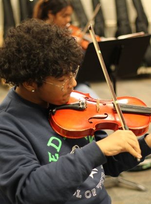 Student playing the violin