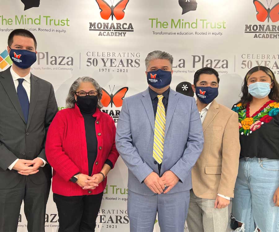 the mind trust group photo at an event